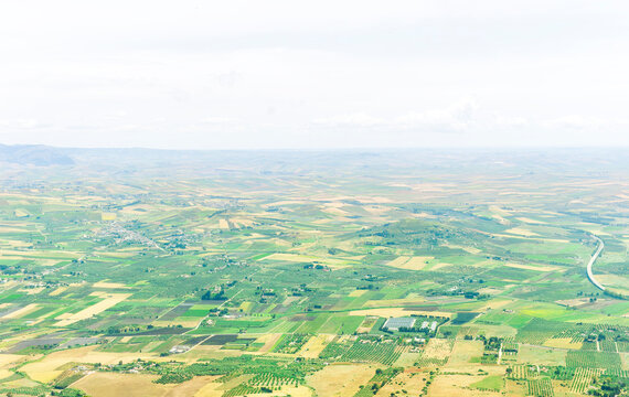 panoramic view from high mountain to a beautiful landscape with valley and fields of great lands far away.