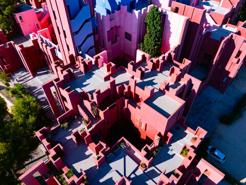 rooftop red modern architecture drone terrace aerial La Muralla Roja shining Calpe Spain Manzanera Ricardo Bofill 