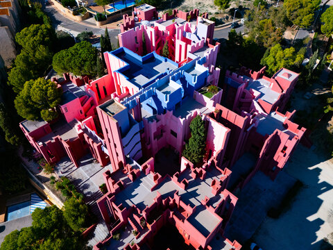 rooftop La Muralla Roja drone landmark red building terrace aerial shining Calpe Spain Manzanera Ricardo Bofill 