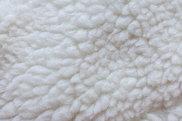 Soft sherpa fleece textile background macro view © Iryna Miadzvedzeva