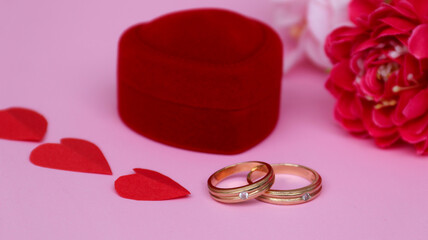 Beautiful shiny gold wedding ring with big diamond gemstone in rich velvet box