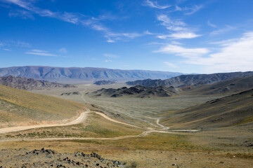 Landscape with dirt road in Altai Tavan Bogd National Park, Mongolia