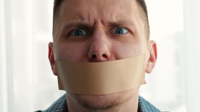 Close-up of sticky tape on lips