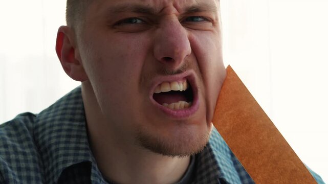 The man is freed from the adhesive tape on his lips and can speak freely.
Freedom of speech.
Expressing one's thoughts.
The right to speak.