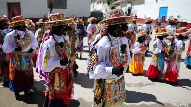 Traditional dance in honor of the Virgin of Carmen in Paucartambo, Cusco, Peru.