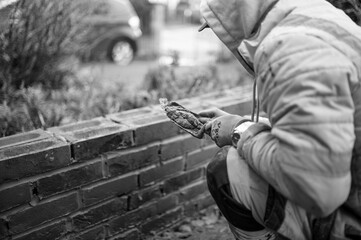 Fototapeta premium building works builders bricking a wall wearing hi vis black and white and colour 