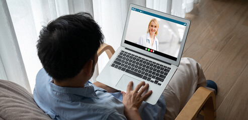 Doctor video call online by modish telemedicine software application for virtual meeting with patient