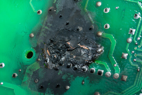 Burnt and melted electronic circuit board after component failure