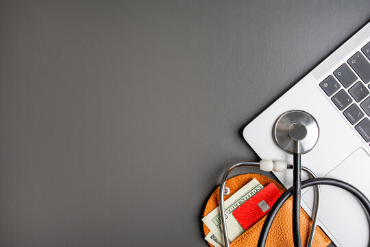Online registration of a doctor's appointment and e-prescription. Stethoscope, calendar and laptop