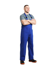 Fototapeta premium Handsome repairman in uniform on white background