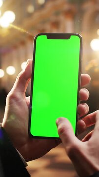 Green Screen 4k man using iphone 12 smartphone viewing on phone press browsing chroma key online typing text reading social media close up hands 24 04 21 st petersburg russia scene 2 with distortion