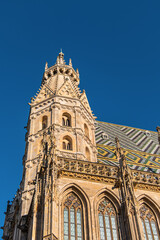 Obraz premium Fragments of St. Stephen's Cathedral (Stephansdom, 1137 - 1578) - symbol of Vienna. Cathedral is mother church of Roman Catholic Archdiocese of Vienna. Stephansplatz, Vienna, Austria.
