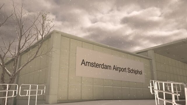 Amsterdam Airport Schiphol exterior with airplane overhead in winter snowfall, Amsterdam, Netherlands