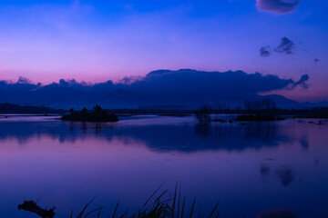A nature view of sunset or sunrise over lake at Phang Nga Thailand