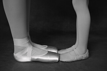 Older and younger dancers feet © Holly