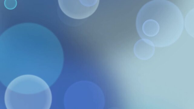 Abstract background with blue and white translucent bokeh lights