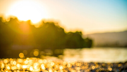 A reflection of the sunset on a river or stream, with a blurred golden bokeh background of a forest.