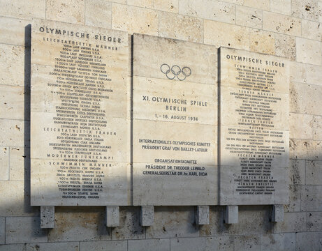 BERLIN-GERMANY MAY 23: Memorial list of gold medals winners of 1936 Berlin Olympic Games with Jesse Owens name prominent Olympiastadion Olympic Stadium in Berlin, Germany