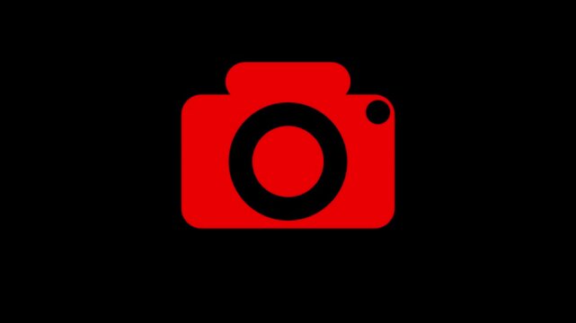 Bold red camera with a black lens and a black circular detail on the right side against a black background