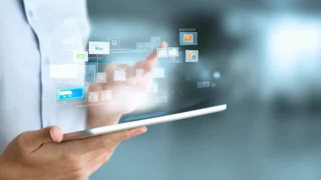 Overtheshoulder view of a person employing a tablet device with intuitive app features for streamlined digital application processing.