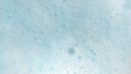 石鹸や洗剤などの一面が細かな泡と大小様々な泡の画像素材　背景・テクスチャー　16:9・8K UHDサイズ（7680 x 4320）水色・青・ライトブルー・スカイブルー・空色・パステル