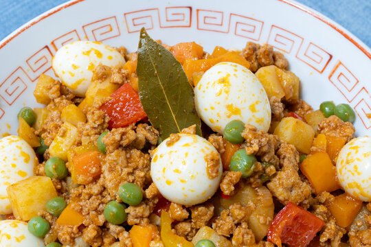 Filipino Picadillo with Quail Eggs Served in a Bowl