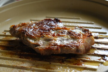 meat steak grill on pan in the kitchen