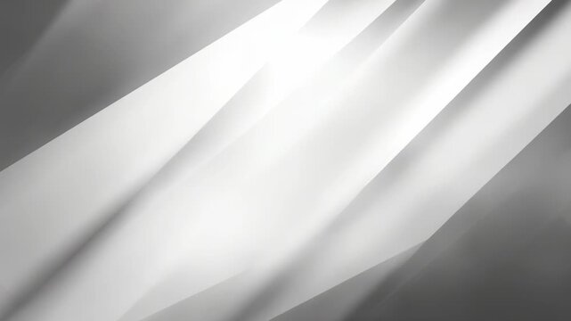 Abstract silver and white gradient background with smooth diagonal lines and soft light effects. Modern minimalistic texture perfect for technology, luxury, or elegant design projects
