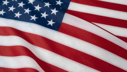 Fototapeta premium Close up shows the stars and stripes of an american flag waving gently
