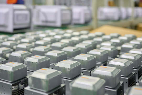 Magnetrons sit in a factory ready for assembly into microwave ovens during production process