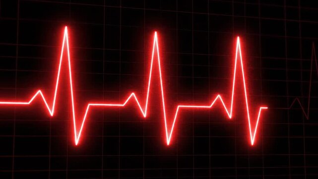 Close-up of a red ECG heartbeat line graph on a black background with grid lines.