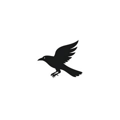 Obraz premium A black silhouette of a bird in flight against a white background