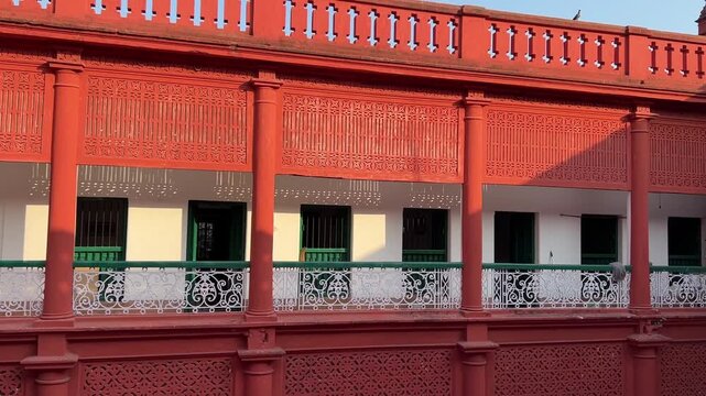 Red coloured balcony of a Zamindar badi in Bengal, India