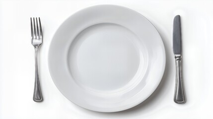 Empty white ceramic plate with fork and knife arranged symmetrically on white background, top view.
