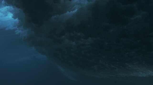 Dark underwater wave turbulence with rolling textures and moody deep ocean tones