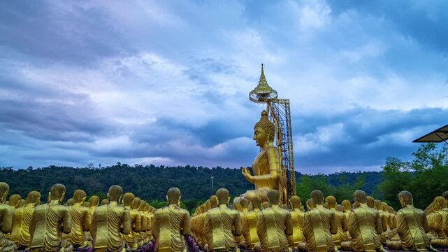  Surrounded by lush hills and open skies, the golden Buddha statues form a tranquil sanctuary for worship, meditation, and candlelight processions, especially during Makha Bucha Day ceremonies.