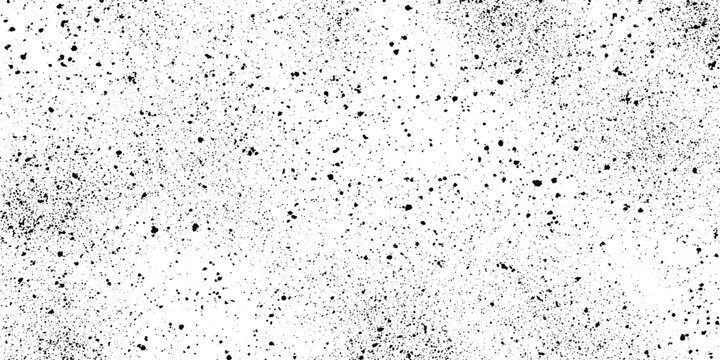 White speckled texture with scattered black dots abstract grunge background black distressed elements, grit, and grainy speckles.