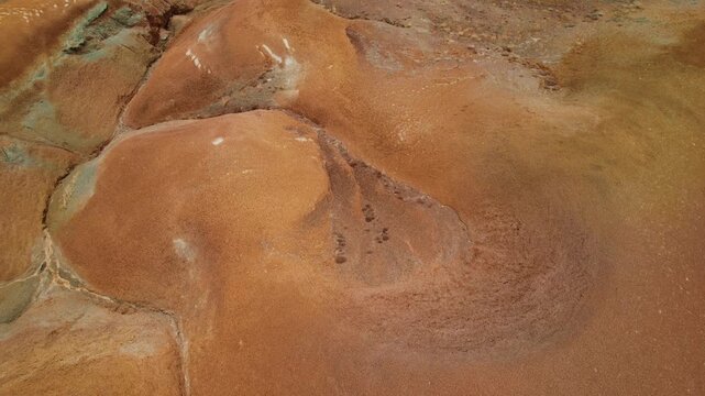 Gobi desert or Altai Republic Russia, texture of red sandstone Mars valley, aerial top view.