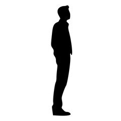 Fototapeta premium Silhouette of a person standing with hands clasped behind their back