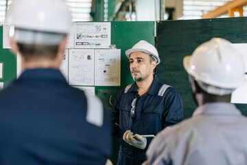 Professional senior lead supervisor engineer man training young engineer team in industry factory © Quality Stock Arts