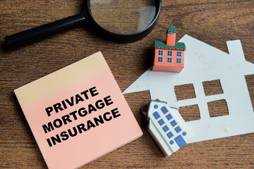 Concept of private mortgage insurance write on sticky notes isolated on Wooden Table.
