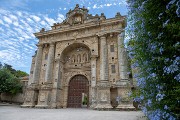 Obraz premium Facade Detail with Blue Flowers at La Cartuja