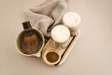 Hojicha latte drinks with chasen whisk and tea powder