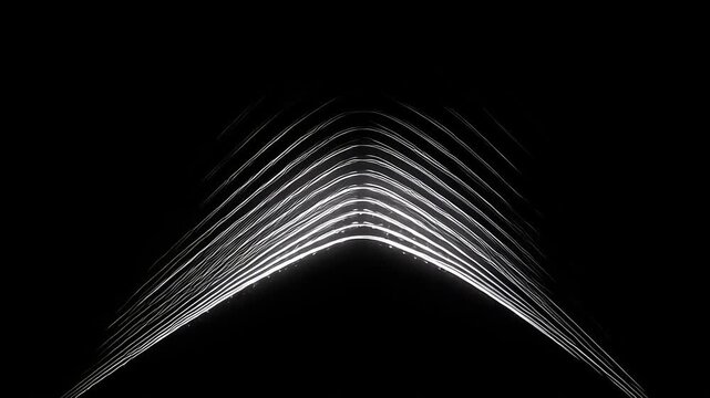 Abstract black and white curved lines forming an arch shape.