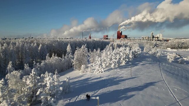 Paper mill factory in cold February day, Oulu Finland