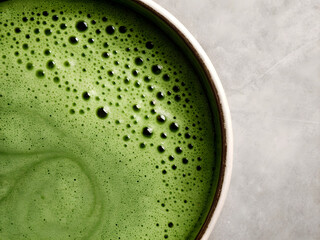 macro top down glass of hot green tea on background