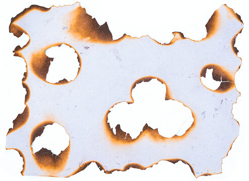 Collection of burnt holes in piece of paper isolated on white background, design elements