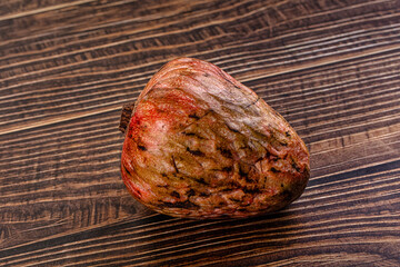 Exotic cherimoya fruit on a wooden table background