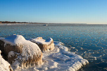 Frozen Baltic Sea Coastline in Liepaja Latvia with Snow and Ice Formations © Zigmunds