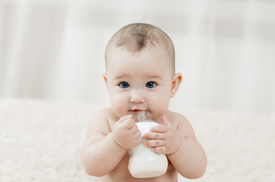 charming girl eating alone mixture, sitting porridge